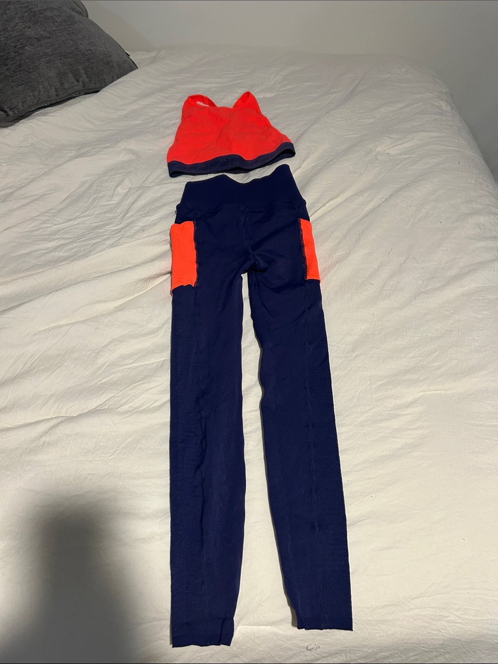 Fabletics Navy and Neon Orange Seamless Two-Piece Active Set